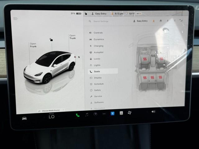 Photo of 2025 Pearl White Multi-Coat Tesla Model Y