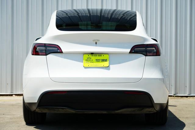 Photo of 2025 Pearl White Multi-Coat Tesla Model Y