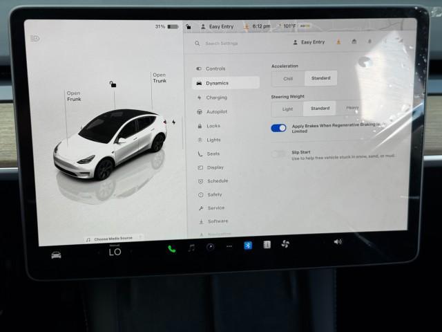 Photo of 2025 Pearl White Multi-Coat Tesla Model Y