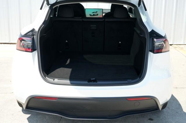Photo of 2025 Pearl White Multi-Coat Tesla Model Y