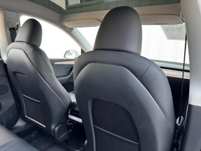 Photo of 2025 Pearl White Multi-Coat Tesla Model Y