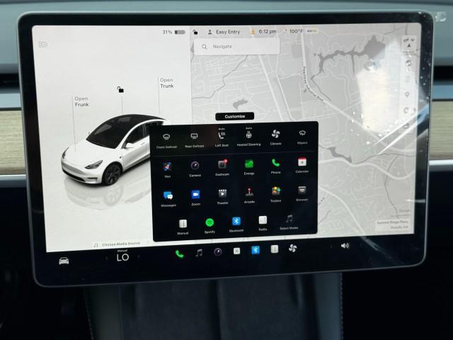 Photo of 2025 Pearl White Multi-Coat Tesla Model Y