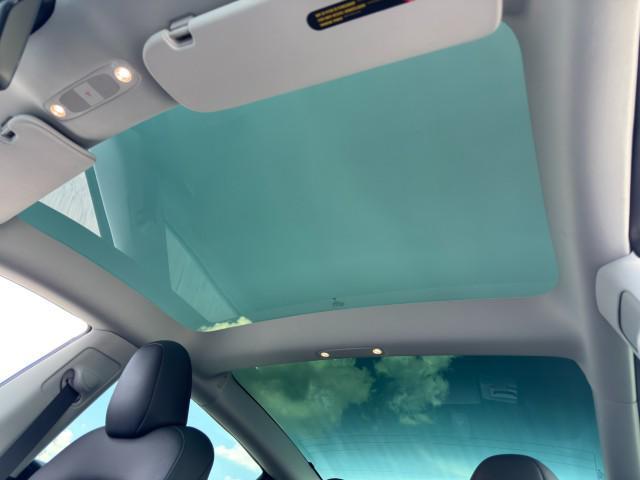Photo of 2023 Pearl White Multi-Coat Tesla Model 3