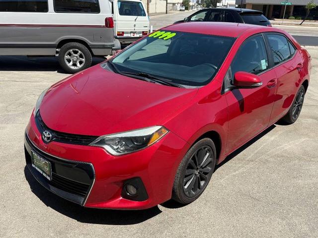 Photo of 2014 Barcelona Red Metallic Toyota Corolla