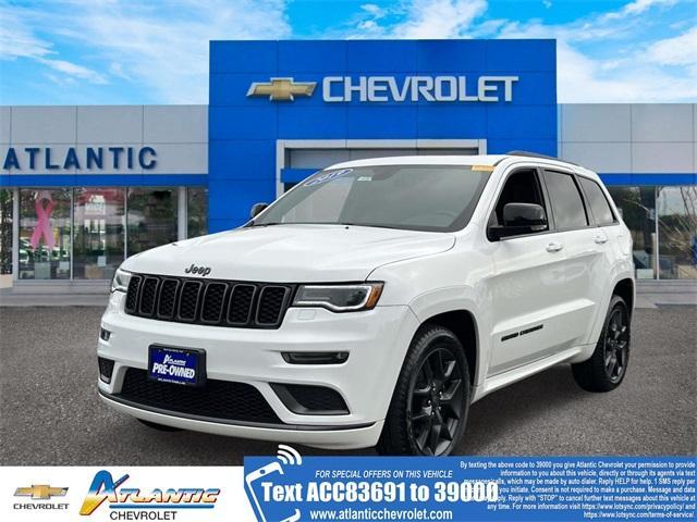 Photo of 2019 Bright White Clearcoat Jeep Grand Cherokee