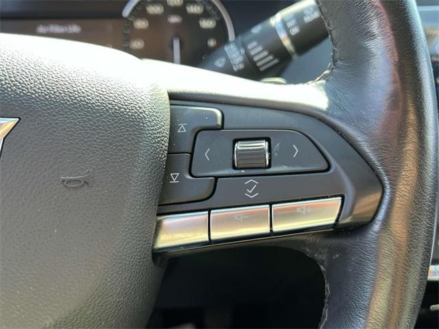 Photo of 2023 Wave Metallic Cadillac XT4