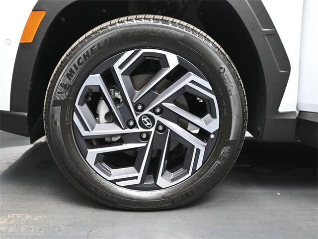Photo of 2025 Creamy White Pearl Hyundai TUCSON Plug-In Hybrid