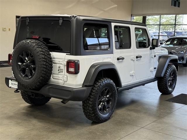 Photo of 2022 Bright White Clearcoat Jeep Wrangler Unlimited