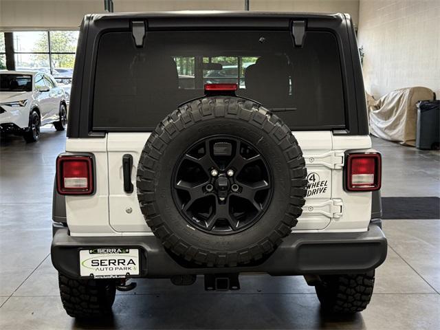 Photo of 2022 Bright White Clearcoat Jeep Wrangler Unlimited