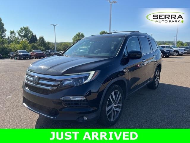Photo of 2018 Crystal Black Pearl Honda Pilot