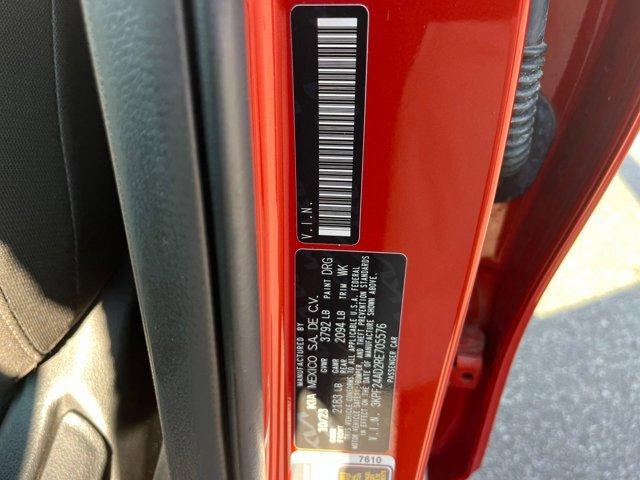 Photo of 2024 Fire Orange Kia Forte