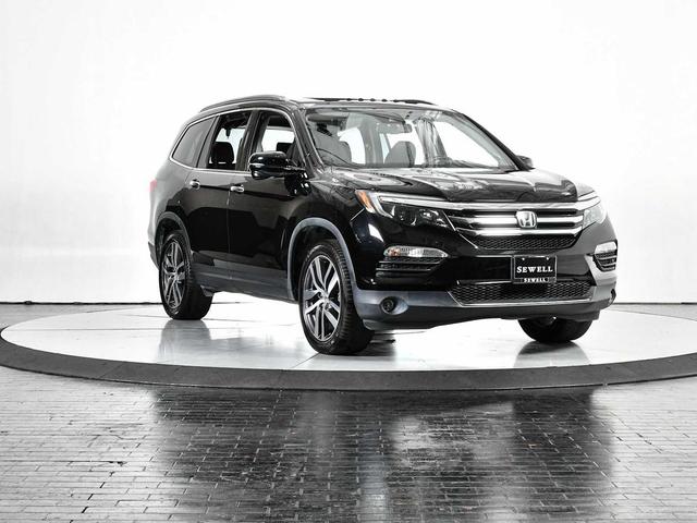 Photo of 2017 Crystal Black Pearl Honda Pilot