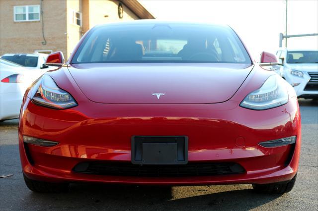 Photo of 2018 Red Multi-Coat Tesla Model 3