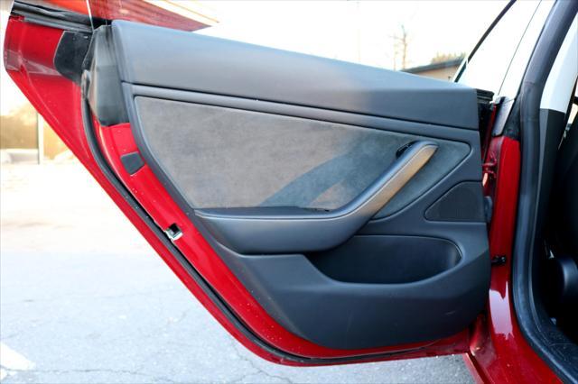 Photo of 2018 Red Multi-Coat Tesla Model 3