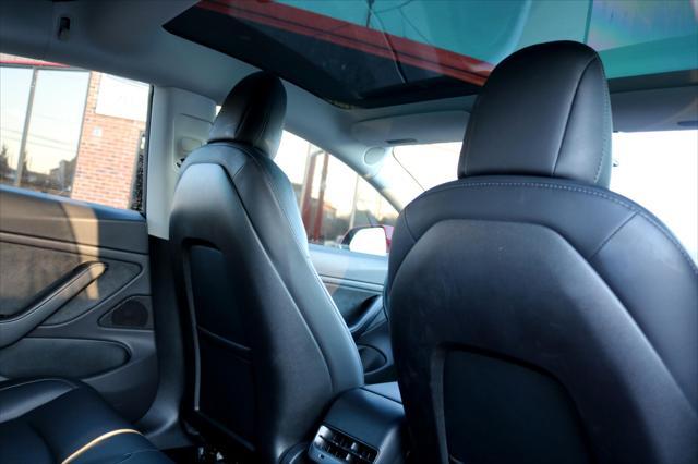 Photo of 2018 Red Multi-Coat Tesla Model 3