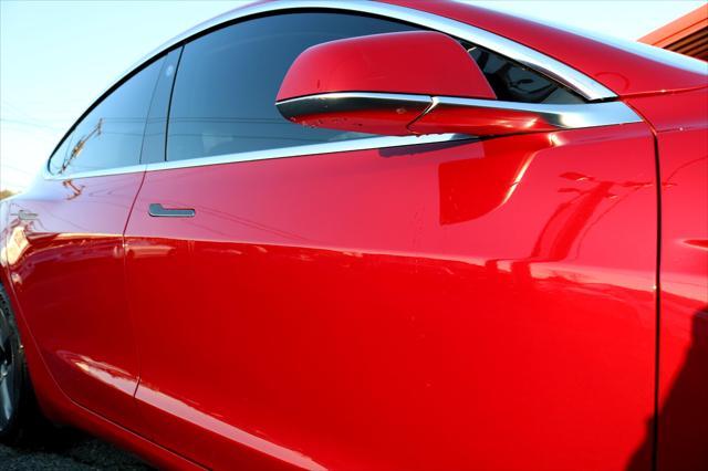 Photo of 2018 Red Multi-Coat Tesla Model 3