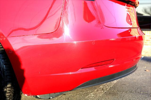 Photo of 2018 Red Multi-Coat Tesla Model 3