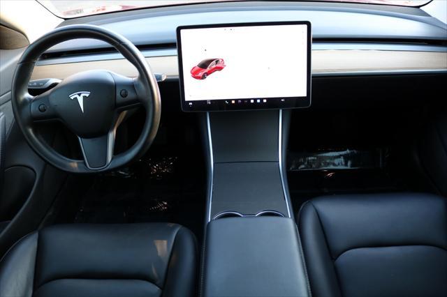 Photo of 2018 Red Multi-Coat Tesla Model 3