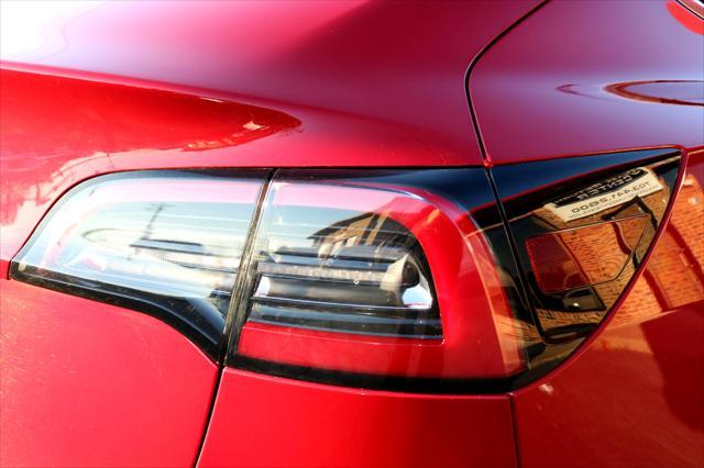 Photo of 2018 Red Multi-Coat Tesla Model 3