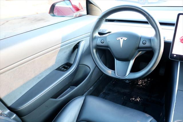 Photo of 2018 Red Multi-Coat Tesla Model 3