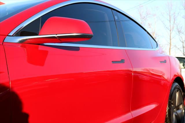 Photo of 2018 Red Multi-Coat Tesla Model 3