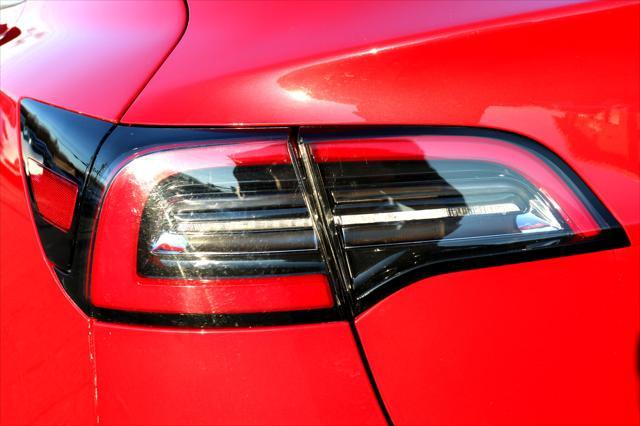 Photo of 2018 Red Multi-Coat Tesla Model 3
