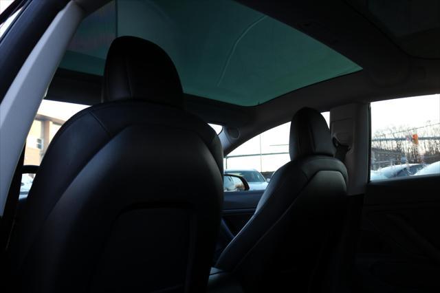 Photo of 2018 Red Multi-Coat Tesla Model 3