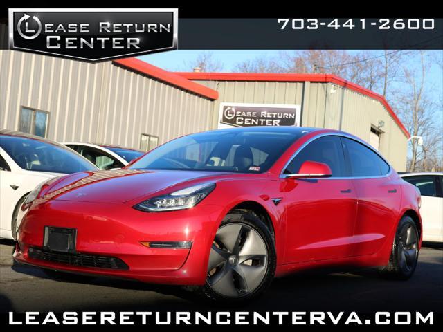 Photo of 2018 Red Multi-Coat Tesla Model 3