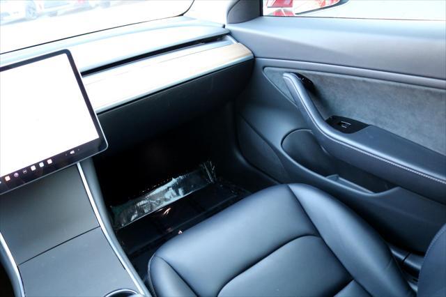Photo of 2018 Red Multi-Coat Tesla Model 3