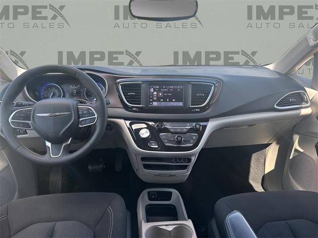 Photo of 2023 Bright White Clearcoat Chrysler Voyager