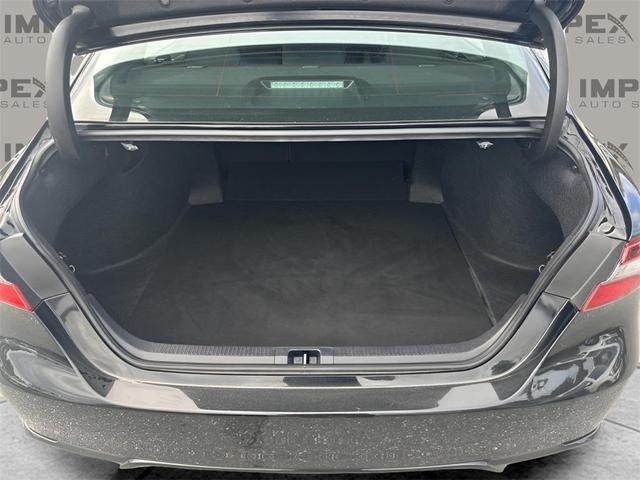 Photo of 2024 Midnight Black Metallic Toyota Camry