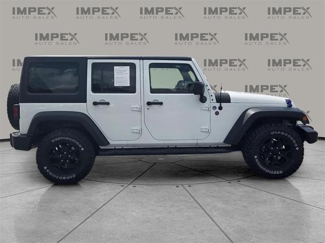 Photo of 2016 Bright White Clearcoat Jeep Wrangler Unlimited