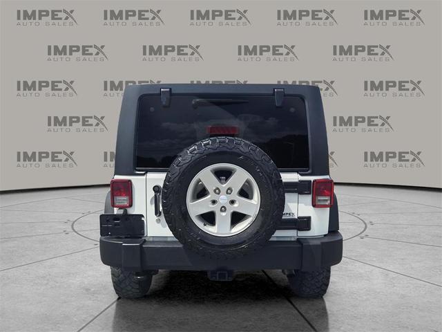 Photo of 2016 Bright White Clearcoat Jeep Wrangler Unlimited