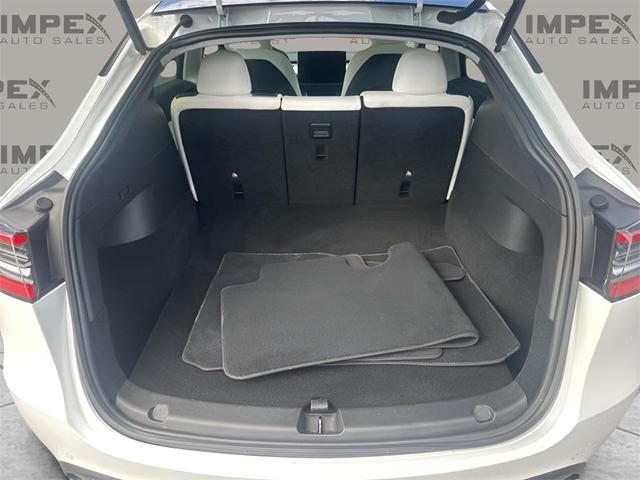 Photo of 2021 Pearl White Multi-Coat Tesla Model Y