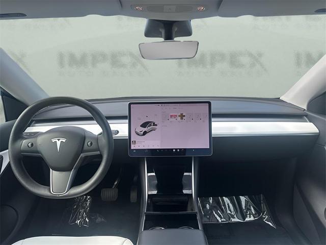 Photo of 2021 Pearl White Multi-Coat Tesla Model Y
