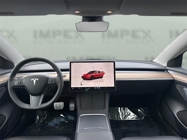 Photo of 2023 Red Multi-Coat Tesla Model 3