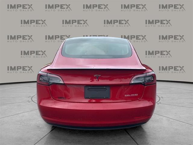 Photo of 2023 Red Multi-Coat Tesla Model 3