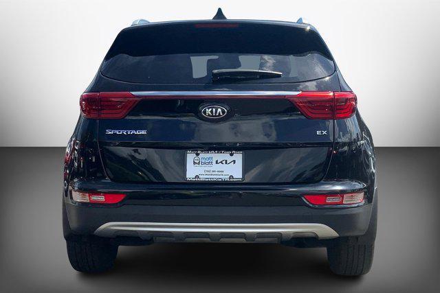 Photo of 2019 Black Cherry Kia Sportage