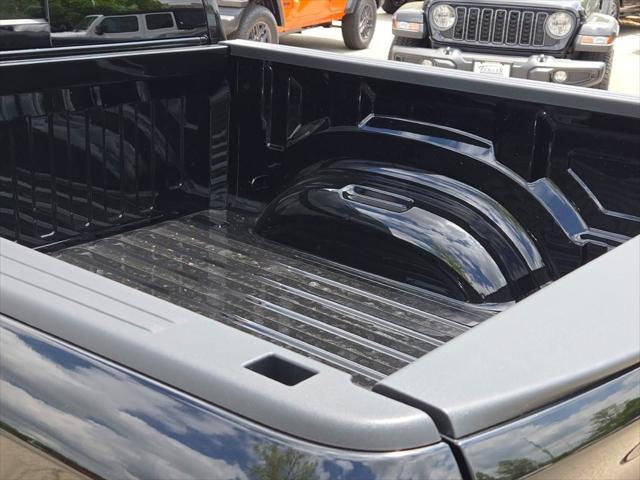 Photo of 2025 Diamond Black Crystal Pearlcoat RAM 1500