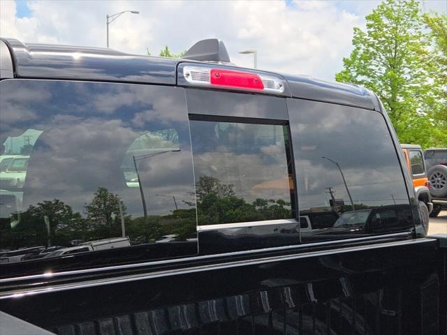 Photo of 2025 Diamond Black Crystal Pearlcoat RAM 1500