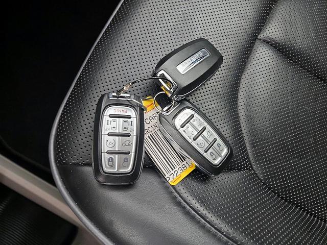 Photo of 2018 Burgundy Chrysler Pacifica Hybrid