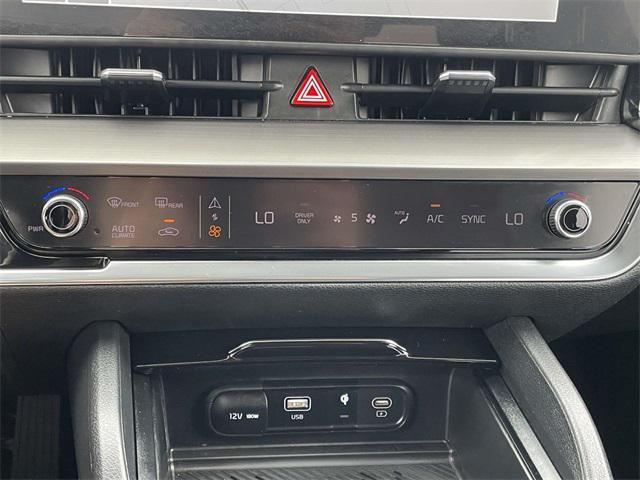 Photo of 2023 Fusion Black Kia Sportage Hybrid