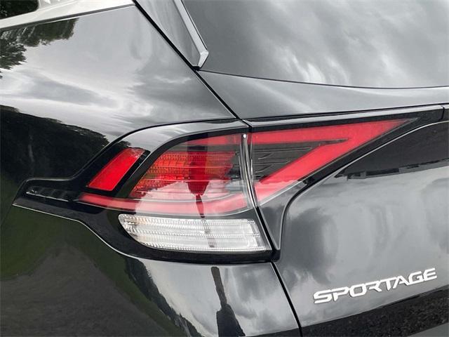 Photo of 2023 Fusion Black Kia Sportage Hybrid