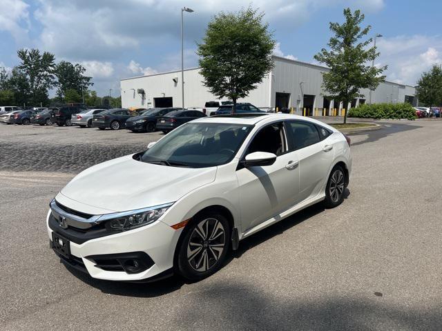 Photo of 2018 White Orchid Pearl Honda Civic