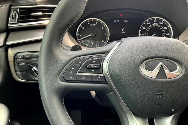 Photo of 2025 Cloud White INFINITI QX50