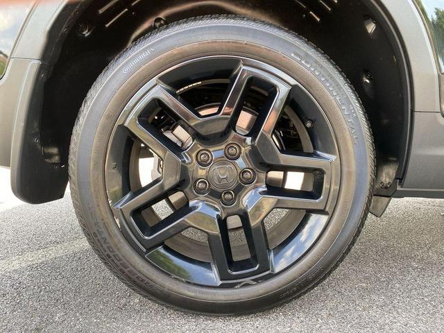 Photo of 2024 Crystal Black Pearl Honda Passport