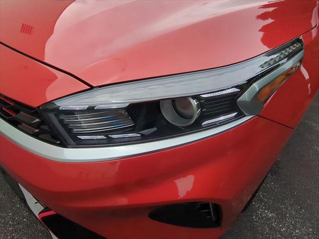 Photo of 2023 Fire Orange Kia Forte