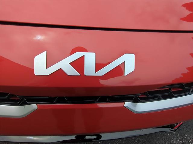 Photo of 2023 Fire Orange Kia Forte