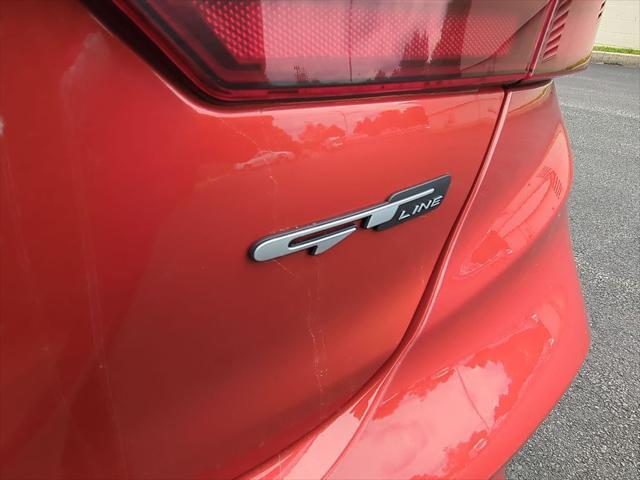 Photo of 2023 Fire Orange Kia Forte