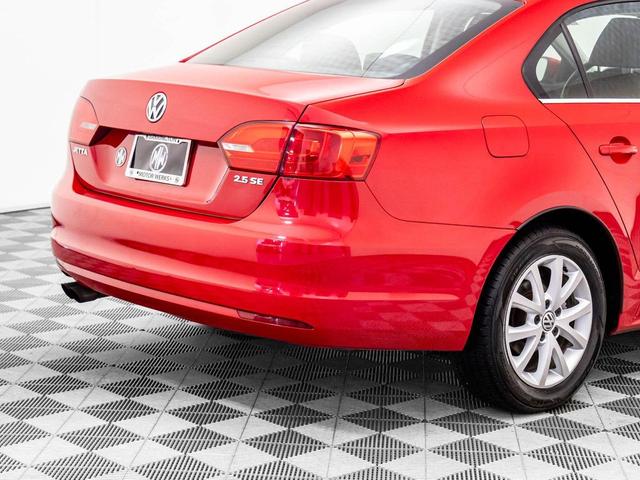 Photo of 2013 Tornado Red Volkswagen Jetta
